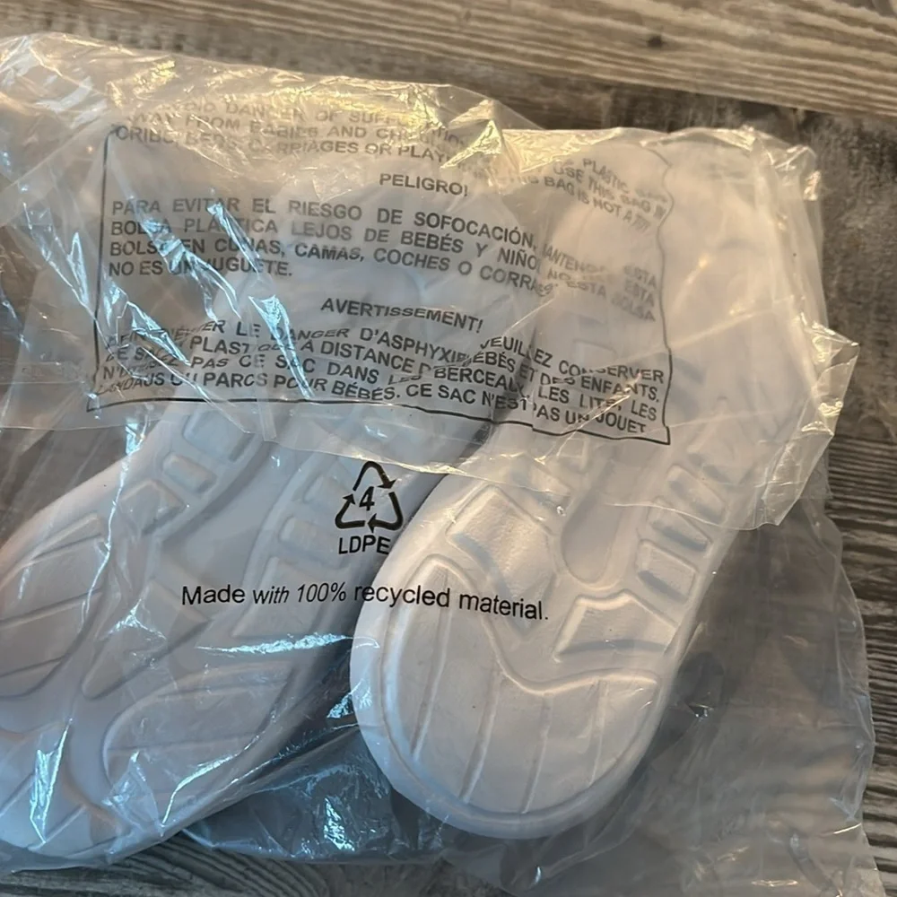 Brand New Kids Slip On black and grey sneakers.